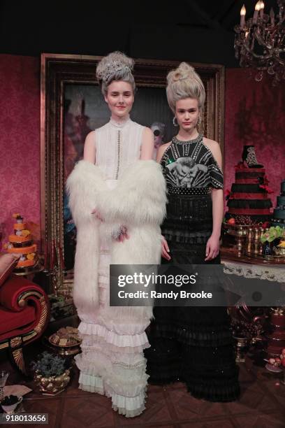 Models pose at the Alice + Olivia By Stacey Bendet Presentation during New York Fashion Week at Industria Studios on February 13, 2018 in New York...