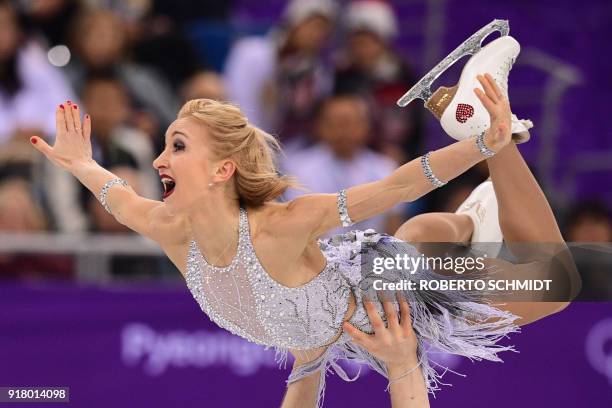 Germany's Aljona Savchenko competes in the pair skating short program of the figure skating event during the Pyeongchang 2018 Winter Olympic Games at...