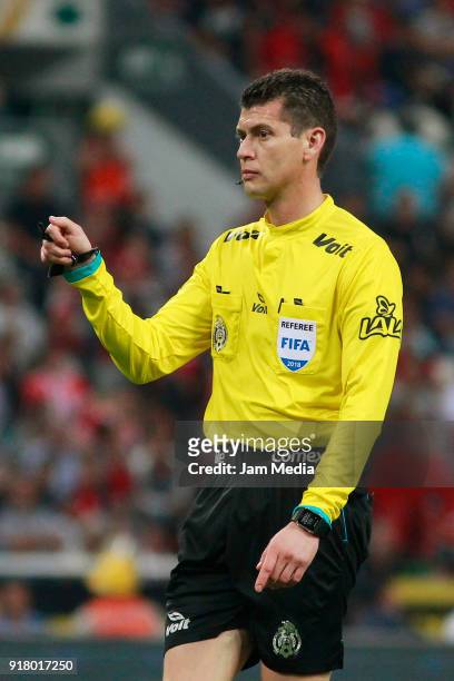 Referee Erick Yahir Miranda gestures during the 7th round match between Atlas and Necaxa as part of the Torneo Clausura 2018 Liga MX at Jalisco...
