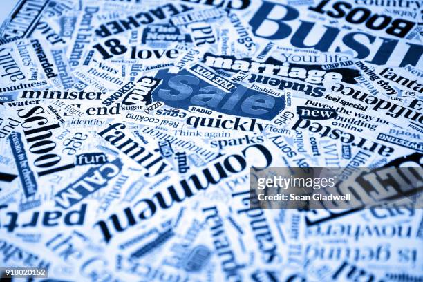 in the news - ripped newspaper headline stock pictures, royalty-free photos & images