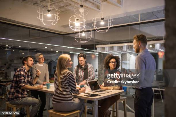 large group of entrepreneurs having a constructive meeting in the office. - brainstorming stock pictures, royalty-free photos & images