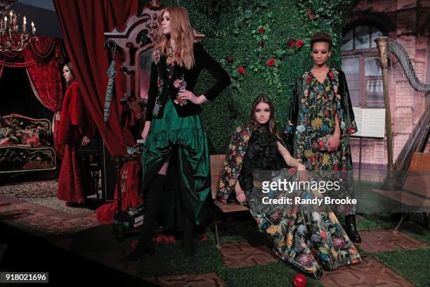 Models pose at the Alice + Olivia By Stacey Bendet Presentation during New York Fashion Week at Industria Studios on February 13, 2018 in New York...