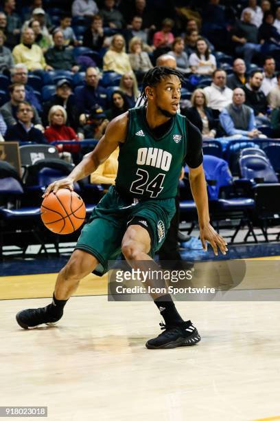 Ohio Bobcats guard Mike Laster dribbles the ball during the second half of a regular season Mid-American Conference game between the Ohio Bobcats and...