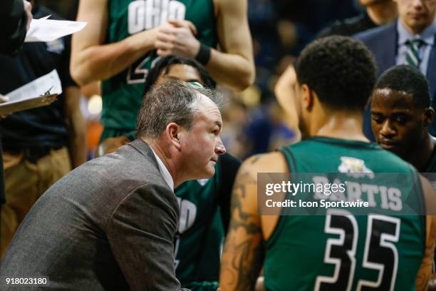 Ohio Bobcats head coach Saul Phillips talks to his team during a timeout during the second half of a regular season Mid-American Conference game...