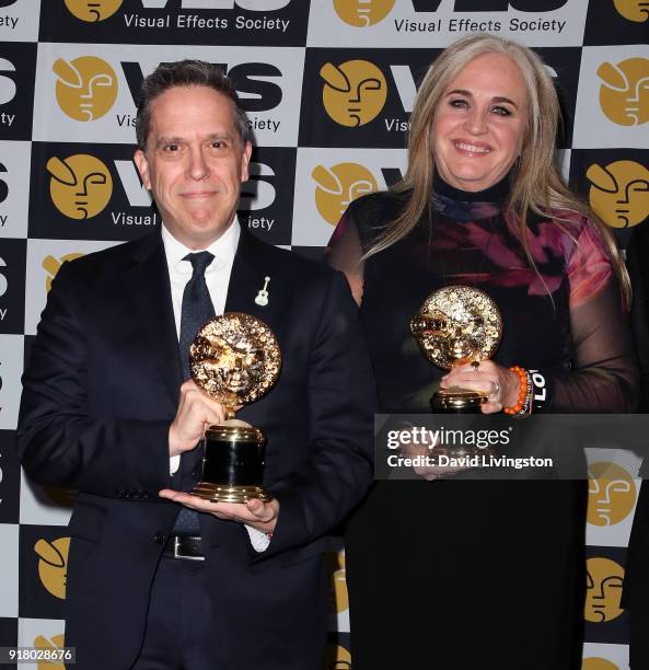 Director Lee Unkrich and producer Darla K. Anderson attend the press room at the 16th Annual VES Awards at The Beverly Hilton Hotel on February 13,...