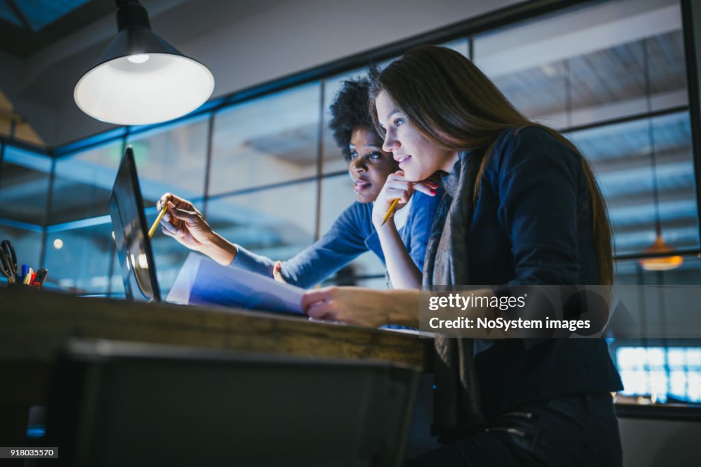 Young female architects working together in architecture studio