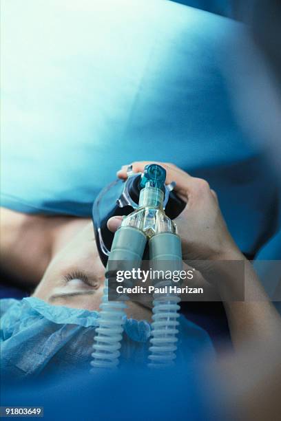 patient taking anesthetic - anesthetist stock pictures, royalty-free photos & images