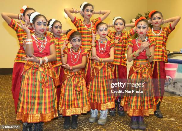 Indian Tamil girls representing the Indian state of Tamil Nadu pose for a photo before competing in a traditional Indian folk dance competition held...