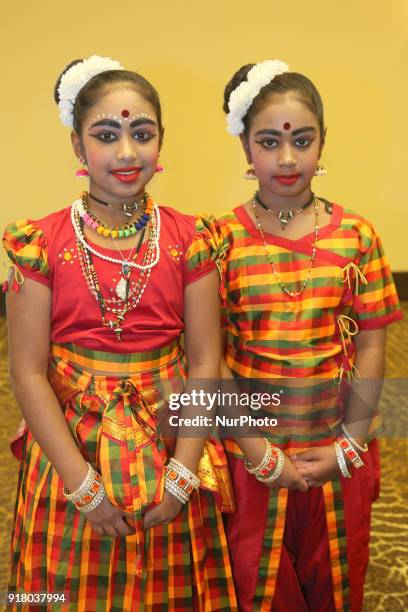 Indian Tamil girls representing the Indian state of Tamil Nadu pose for a photo before competing in a traditional Indian folk dance competition held...