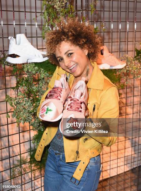 Guest attends PUMA Galentine's Day Event with Yara Shahidi and Elaine Welteroth at Siren Studios on February 13, 2018 in Hollywood, California.