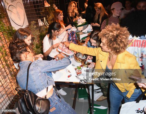 Guest attends PUMA Galentine's Day Event with Yara Shahidi and Elaine Welteroth at Siren Studios on February 13, 2018 in Hollywood, California.