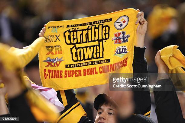 Pittsburgh Steelers fan waves a terrible towel during the game against the San Diego Chargers at Heinz Field on October 4, 2009 in Pittsburgh,...