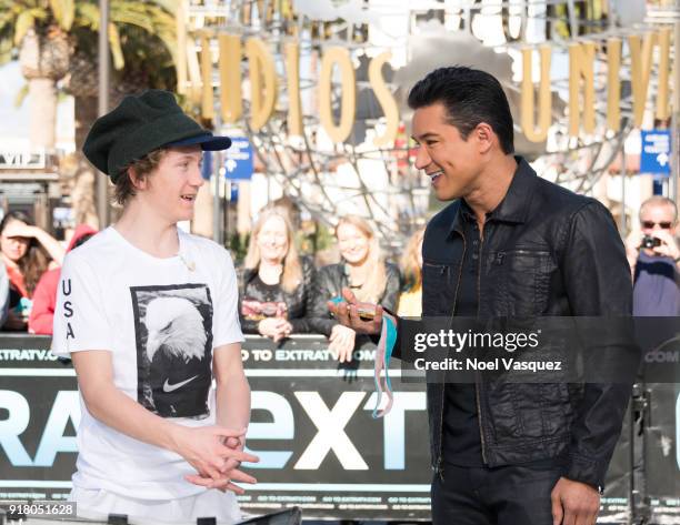 Mario Lopez holds Red Gerard's gold medal at "Extra" at Universal Studios Hollywood on February 13, 2018 in Universal City, California.