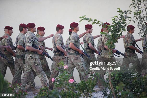 Italian soldiers with the NATO- led International Security Assistance Force march during a changing command ceremony, at the Provincial...