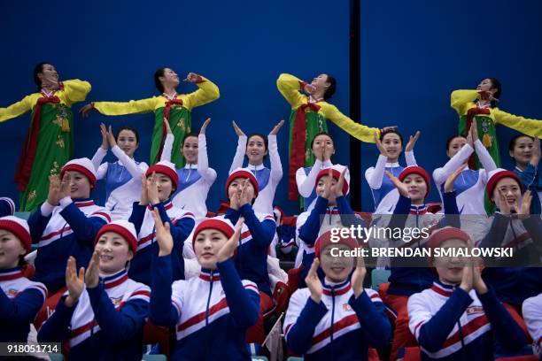 North Korean cheerleaders perform for a women's preliminary round ice hockey match between Unified Korea and Japan during the Pyeongchang 2018 Winter...