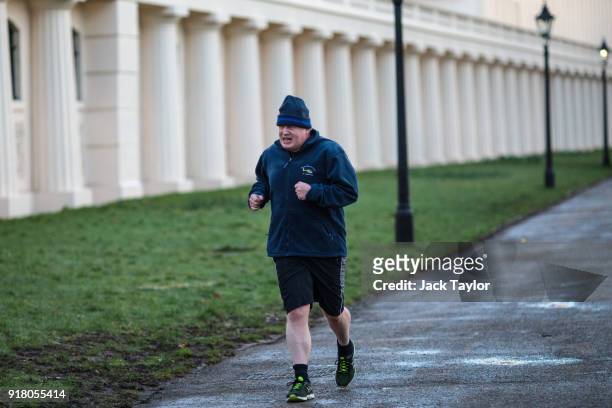 British Foreign Secretary Boris Johnson goes for an early morning jog on February 14, 2018 in London, England. Mr Johnson will today make a speech...
