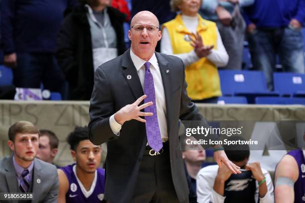 Akron Zips head coach John Groce calls a play during the first half of the men's college basketball game between the Ball State Cardinals and Akron...