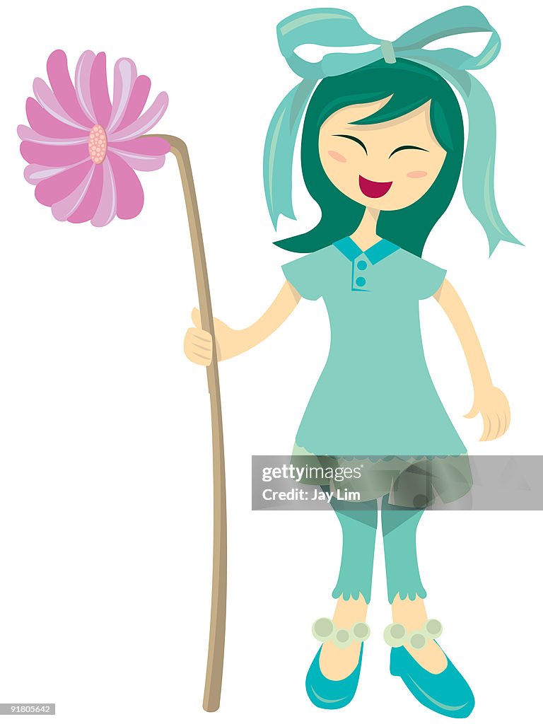 A happy girl holding a tall flower