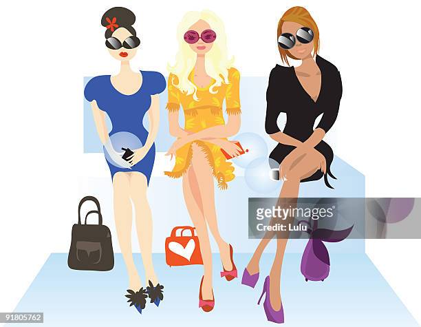 three fashionable seated women holding their personal digital assitants in their hands - organisieren stock illustrations