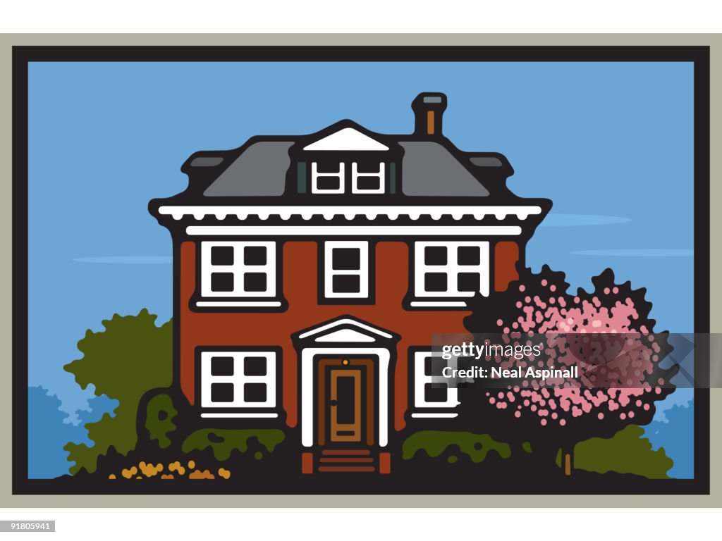 A large house with a pink blossom tree in the front garden