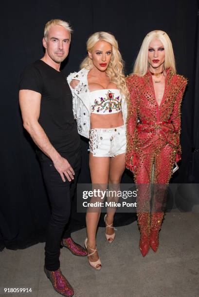 David Blonde, Gigi Gorgeous, and Phillippe Blonde pose backstage at The Blonds fashion show during New York Fashion Week: The Shows at Spring Studios...