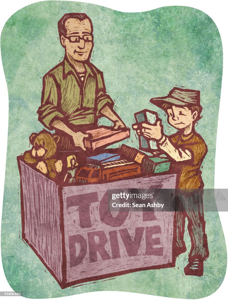 A man and a boy at a toy drive
