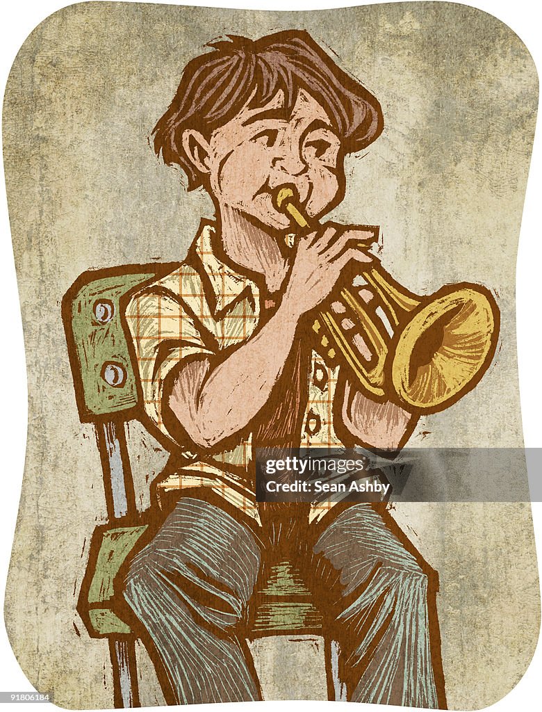 A boy playing a trumpet