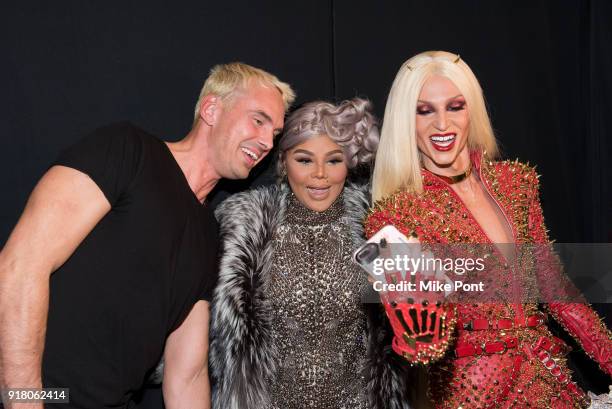 David Blonde, Lil' Kim and Phillippe Blonde pose backstage at The Blonds fashion show during New York Fashion Week: The Shows at Spring Studios on...
