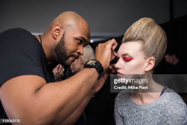 Models prepare backstage at The Blonds fashion show during New York Fashion Week: The Shows at Spring Studios on February 13, 2018 in New York City.