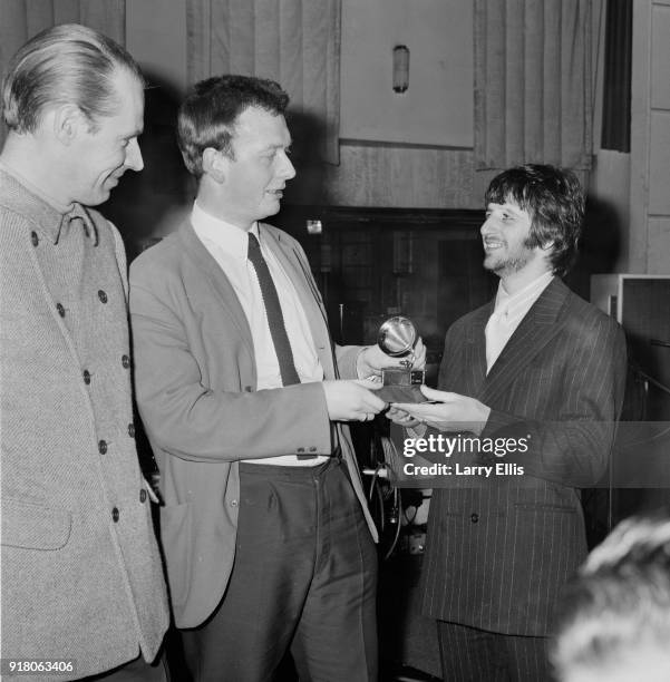 British drummer Ringo Starr of The Beatles with studio audio engineer Geoff Emerick, who won Grammy Award for the engineering of 'Sgt Pepper's Lonely...