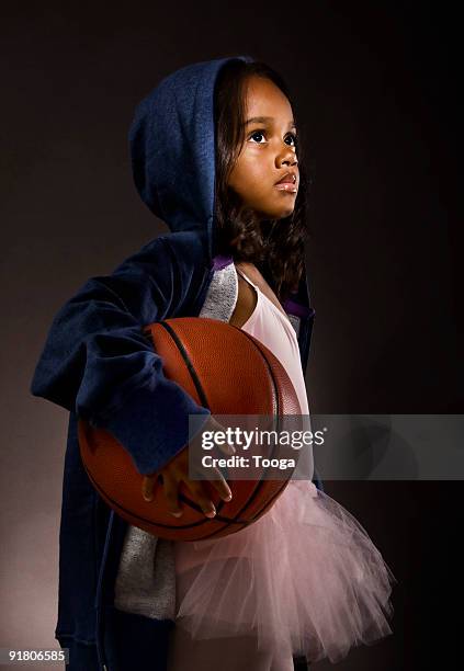 portrait of girl in ballet outfit with basketball - banbossy stock pictures, royalty-free photos & images