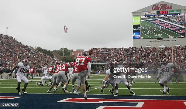 Linebacker Corey Reamer of the Alabama Crimson Tide blocks the kick of punter Tyler Campbell of the Mississippi Rebels game at Vaught-Hemingway...