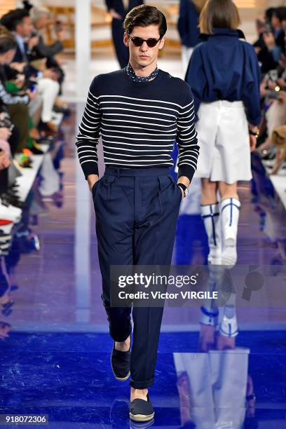 Model walks the runway at Ralph Lauren Ready to Wear Spring/Summer 2018 fashion show during the New York Fashion Week on February 12, 2018 in New...