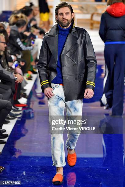 Model walks the runway at Ralph Lauren Ready to Wear Spring/Summer 2018 fashion show during the New York Fashion Week on February 12, 2018 in New...