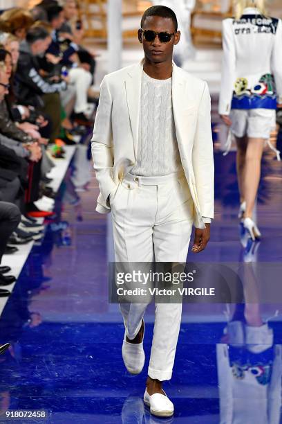 Model walks the runway at Ralph Lauren Ready to Wear Spring/Summer 2018 fashion show during the New York Fashion Week on February 12, 2018 in New...
