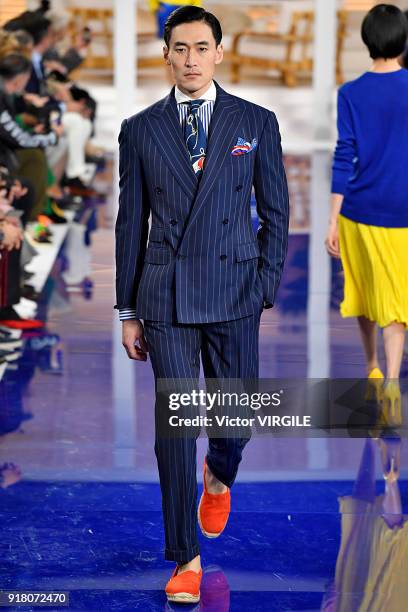 Model walks the runway at Ralph Lauren Ready to Wear Spring/Summer 2018 fashion show during the New York Fashion Week on February 12, 2018 in New...