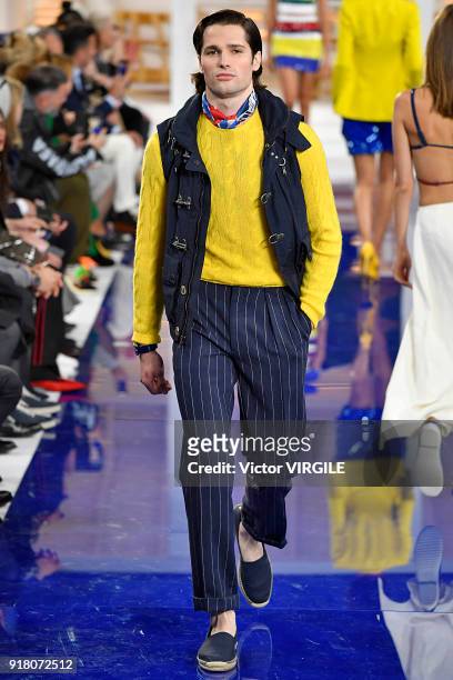 Model walks the runway at Ralph Lauren Ready to Wear Spring/Summer 2018 fashion show during the New York Fashion Week on February 12, 2018 in New...