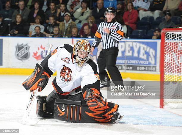 Tyler Bunz of the Medicine Hat Tigers makes a save against the Kelowna Rockets at Prospera Place on October 7, 2009 in Kelowna, Canada.
