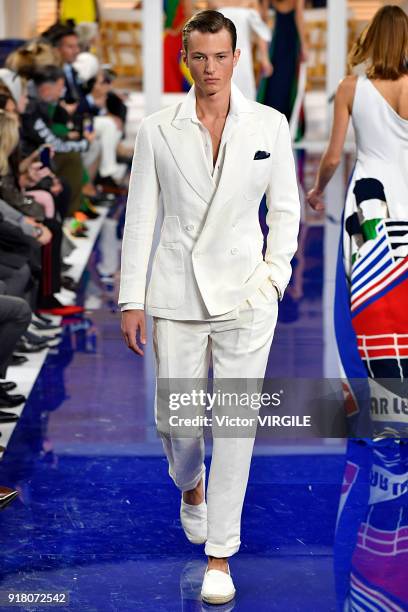 Model walks the runway at Ralph Lauren Ready to Wear Spring/Summer 2018 fashion show during the New York Fashion Week on February 12, 2018 in New...