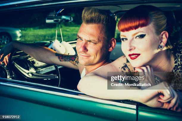 rockabilly couple - rockabilly pin up girls stock pictures, royalty-free photos & images