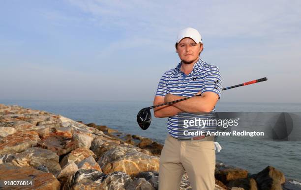 Eddie Pepperell of England poses for a portrait during the Pro Am prior to the start of the NBO Oman Open at Al Mouj Golf on February 14, 2018 in...