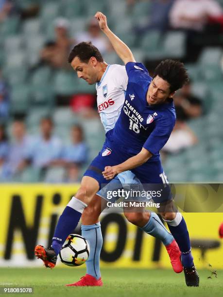 Bobo of Sydney FC competes for the ball against Lee Jong-Sung of the Bluewings during the AFC Asian Champions League match between Sydney FC and...