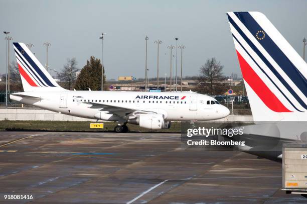 An Air France Airbus A318 aircraft, operated by Air France-KLM Group, taxis on the tarmac at Charles de Gaulle airport, operated by Aeroports de...