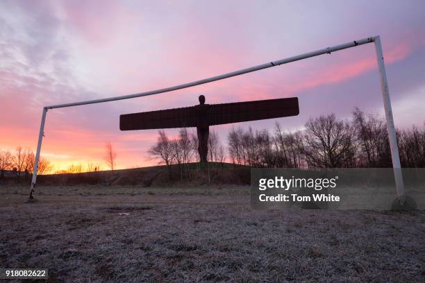 Sunrise at the Angel of the North viewed from the adjacent football pitch on February 14, 2018 in Gateshead, England. Tomorrow marks the 20th...