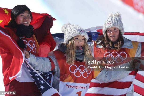 Gold medalist Chloe Kim of the United States celebrates her gold medal win with bronze medalist Arielle Gold of the United States and silver medalist...