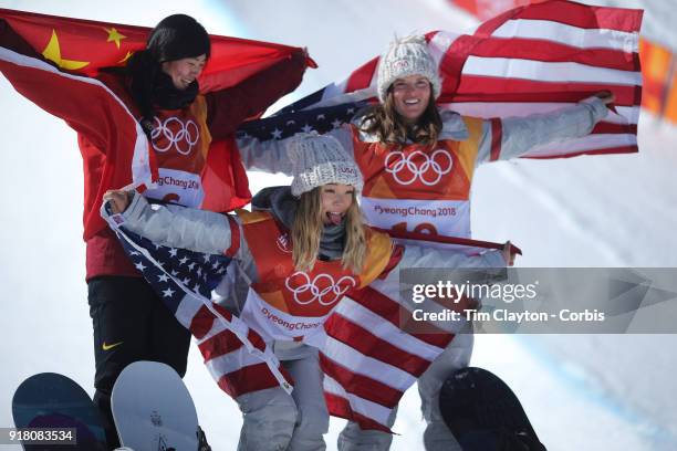 Gold medalist Chloe Kim of the United States celebrates her gold medal win with bronze medalist Arielle Gold of the United States and silver medalist...