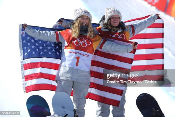 Gold medalist Chloe Kim of the United States celebrates her gold medal win at the presentation with bronze medalist Arielle Gold of the United States...