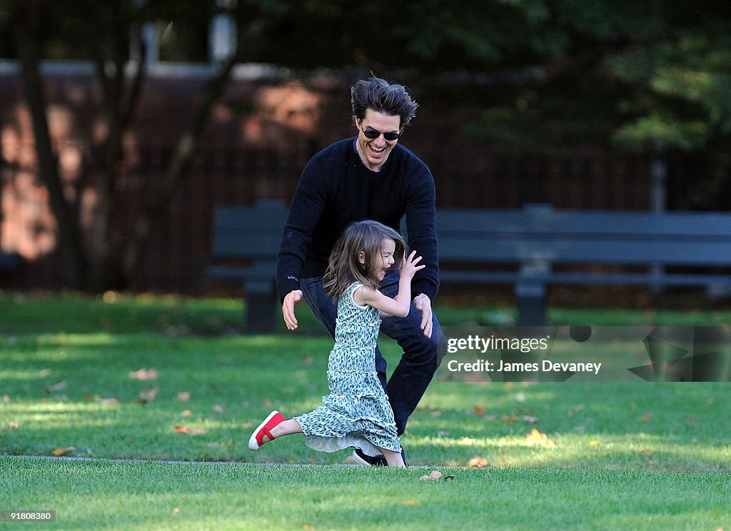 Tom Cruise, Katie Holmes And Suri Cruise Visit Charles River Basin - October 10, 2009