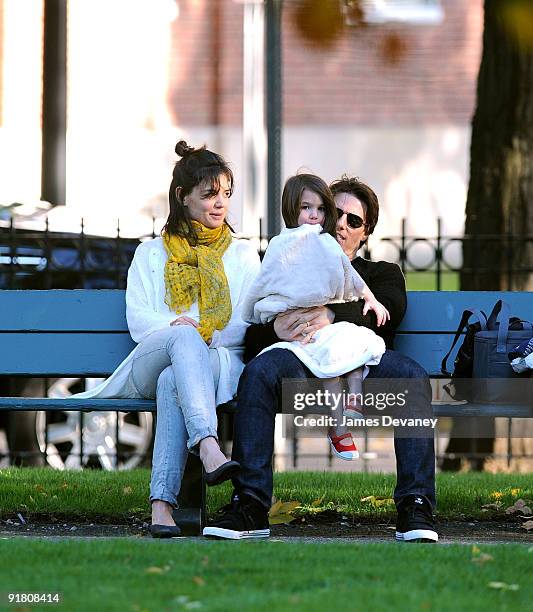 Katie Holmes, Suri Cruise and Tom Cruise visit Charles River Basin on October 10, 2009 in Cambridge, Massachusetts.