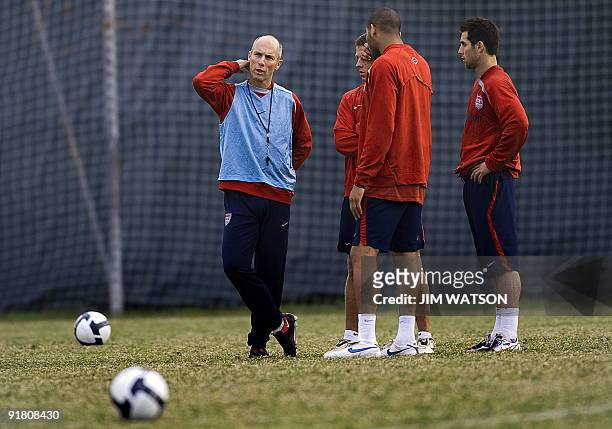 Men's National Team head coiach Bob Bradley speaks with some of his players during practice for the upcoming US v Costa Rica World Cup qualifying...